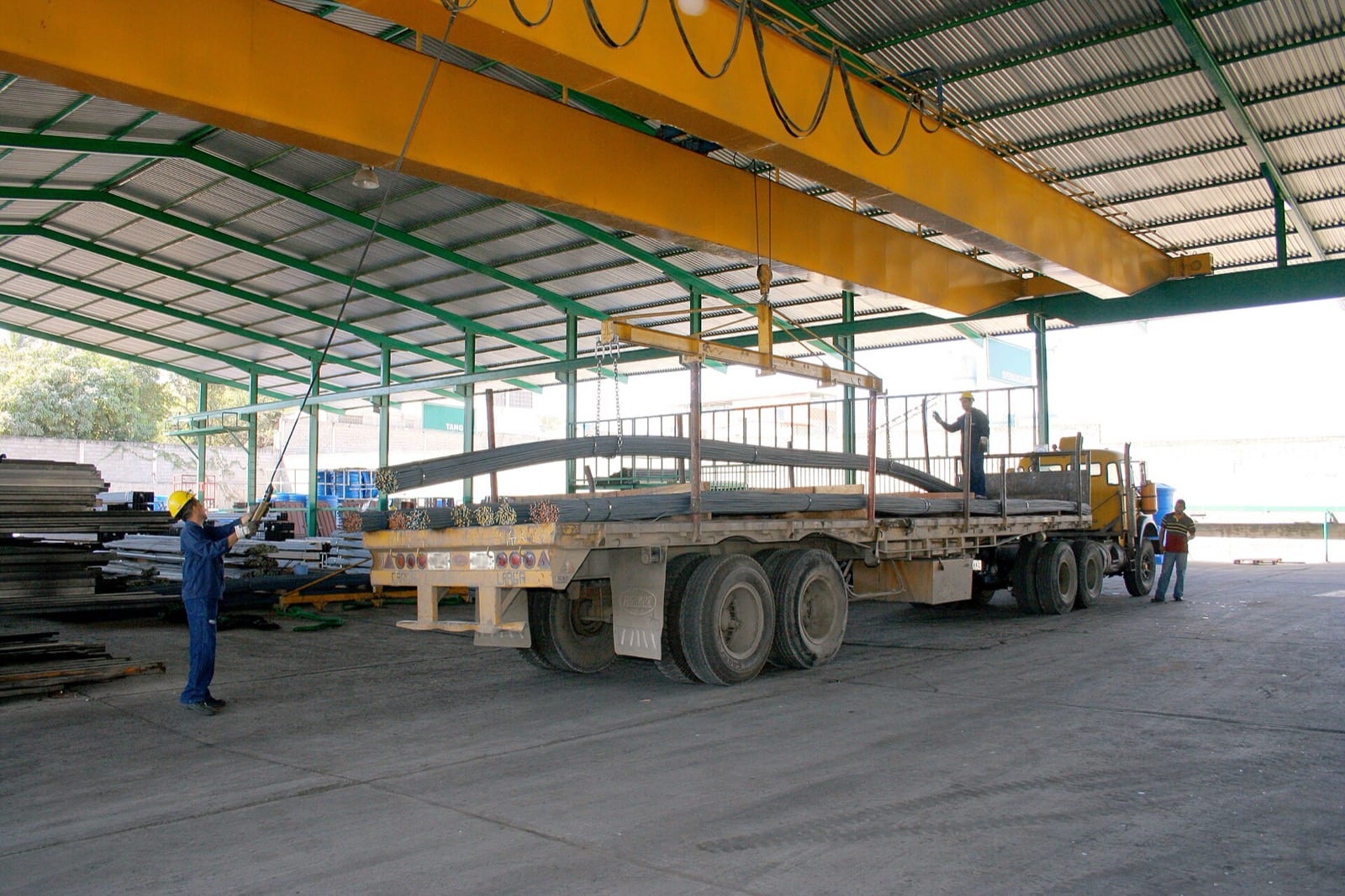 Overhead bridge crane in a manufacturing shop